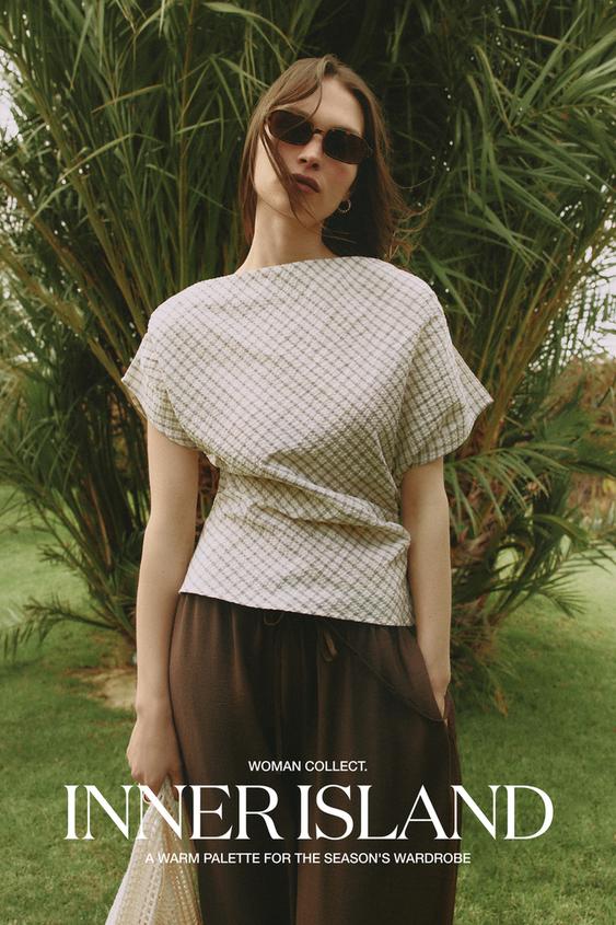 Asymmetric draped top