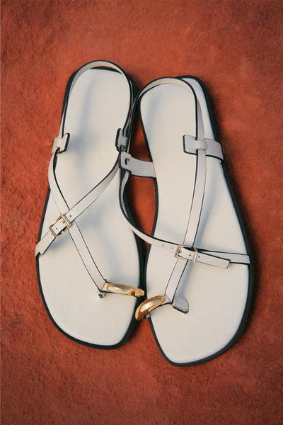 Flat slider sandal with metal detail