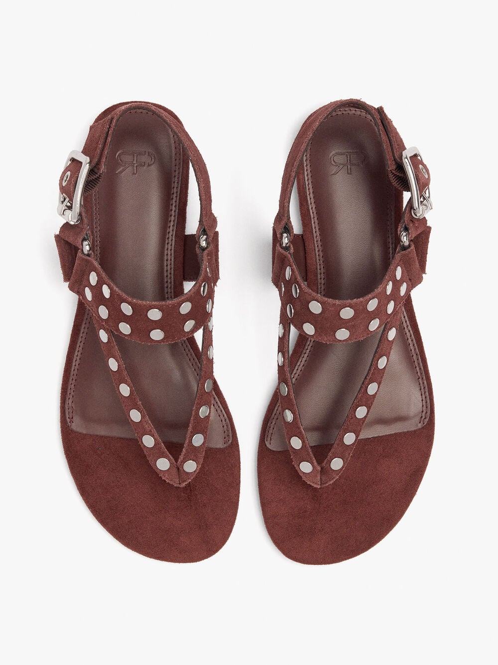 Sandalias planas de piel con tachuelas