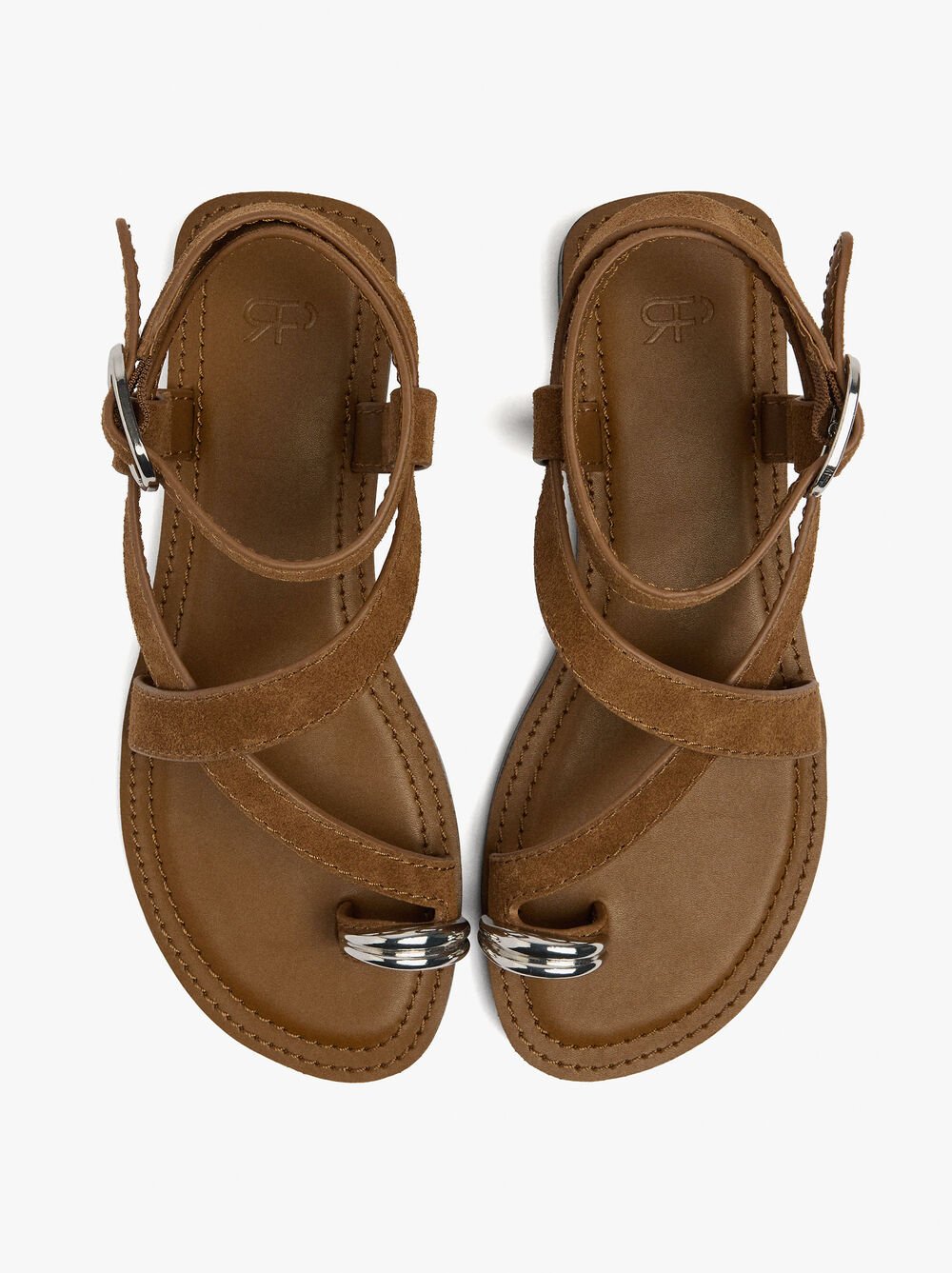 Sandales en cuir croisées avec détail métallique