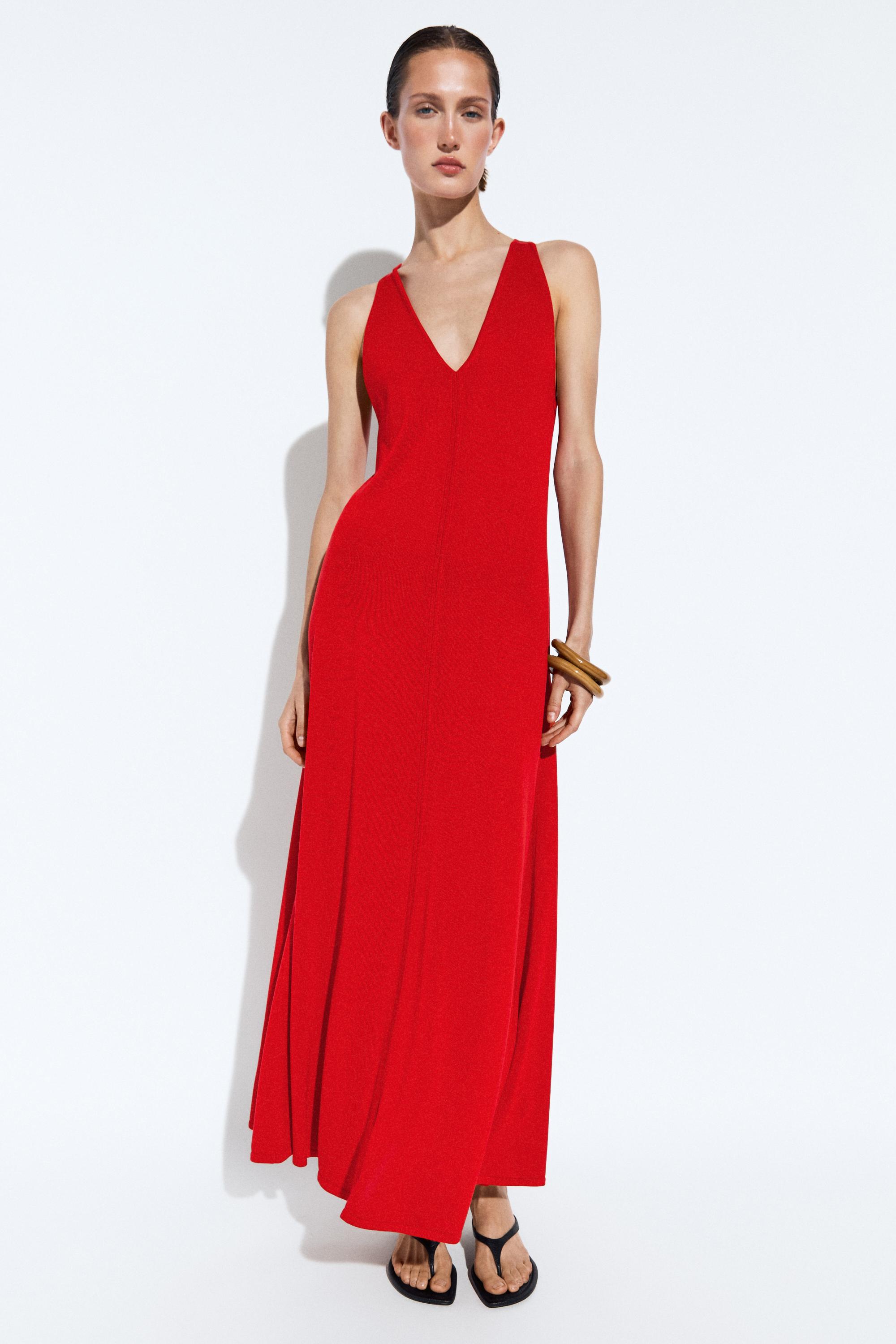 Vestido punto midi escote pico
