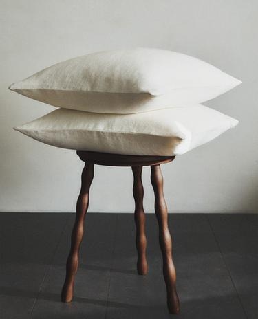 DECORATIVE CUSHION AND STOOL