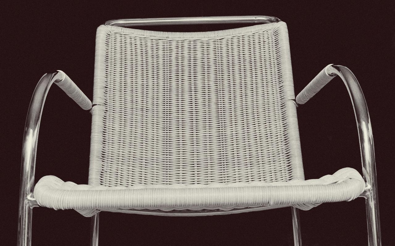 RATTAN AND STEEL ACCENT CHAIR