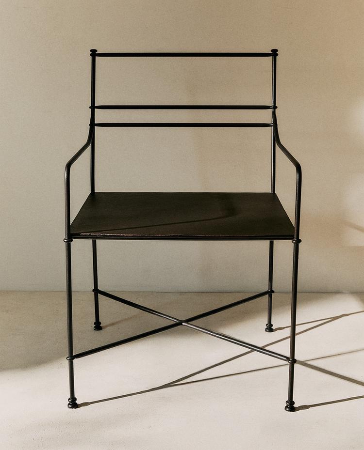 OUTDOOR FORGED METAL ACCENT CHAIR WITH ARMRESTS  OUTDOOR FORGED METAL TABLE  OUTDOOR FORGED METAL CHAIR